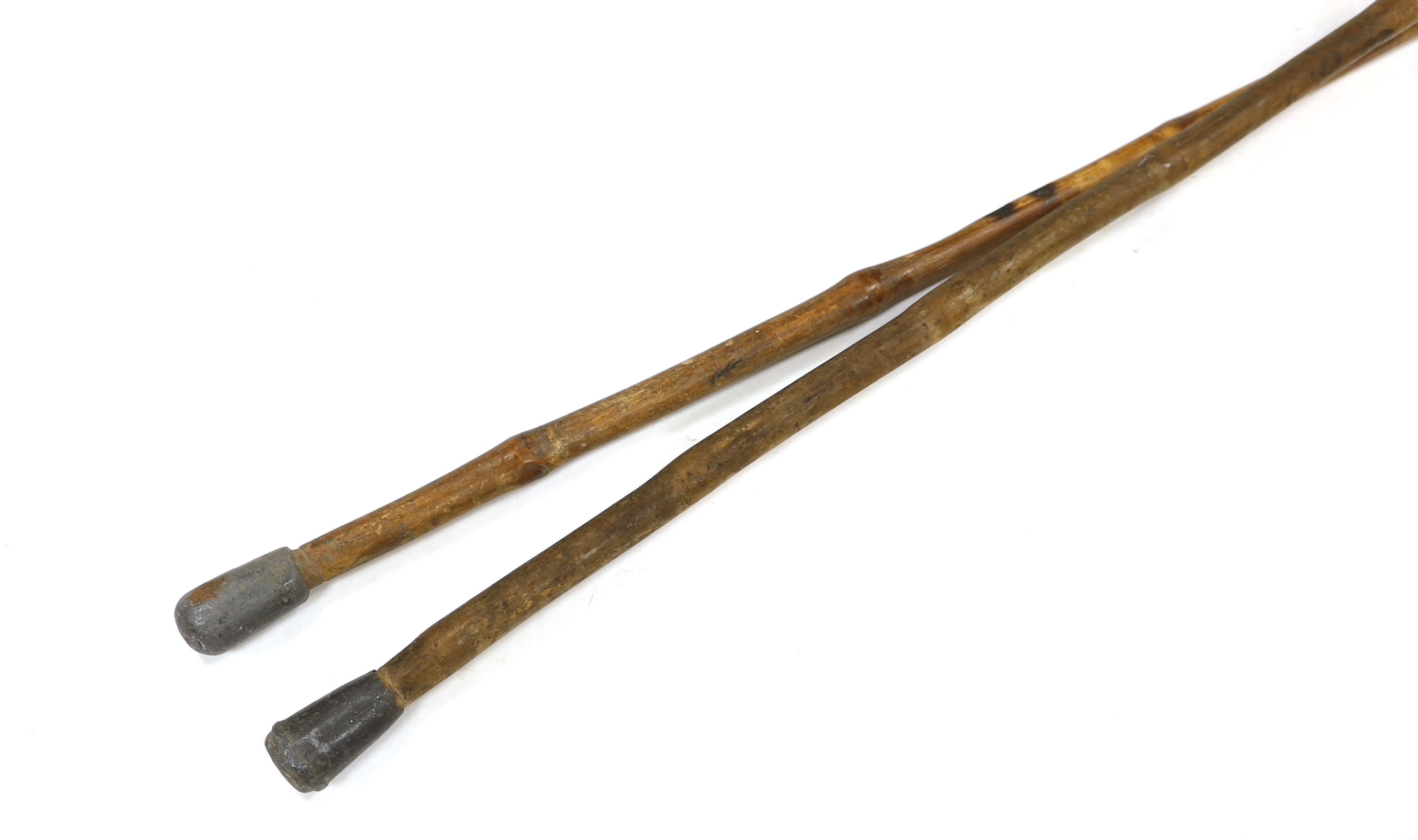 Two late 19th/early 20th century Indian Pig Sticking lances, longer 215cm